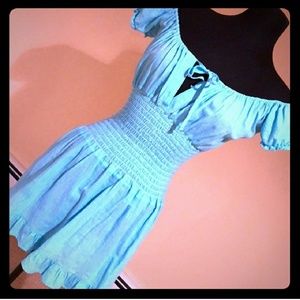Adorable turquoise cold shoulder dress.